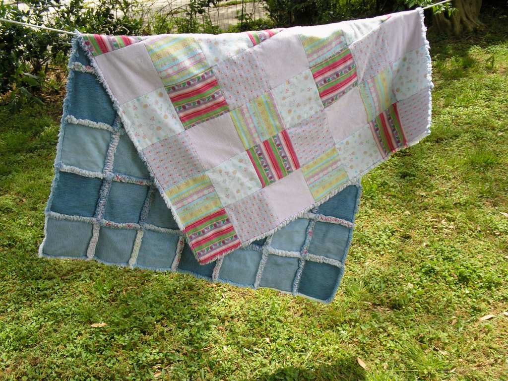flannel and denim quilt hanging
